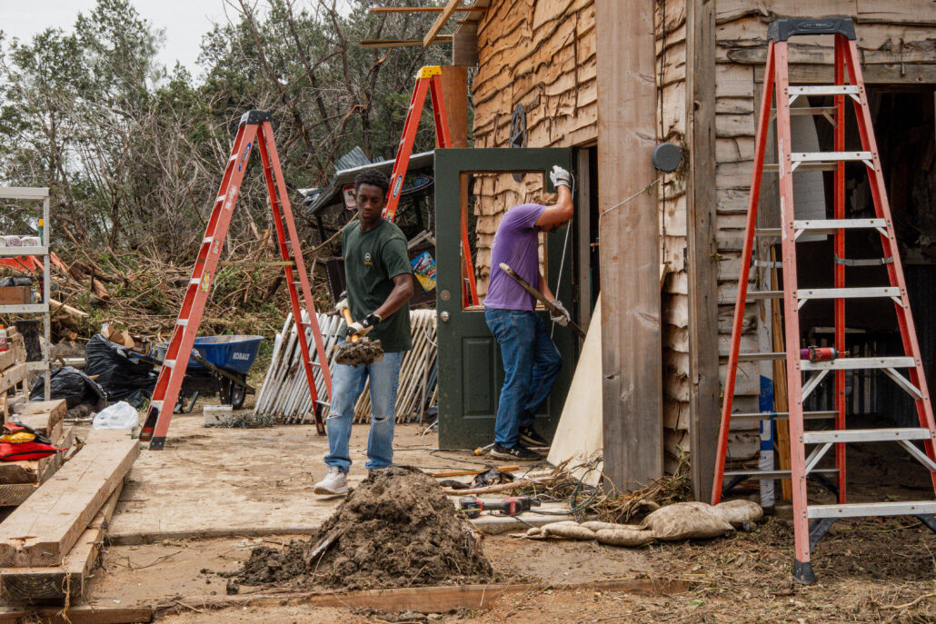 Volunteers doing Mud out Muck out Ark July 2025